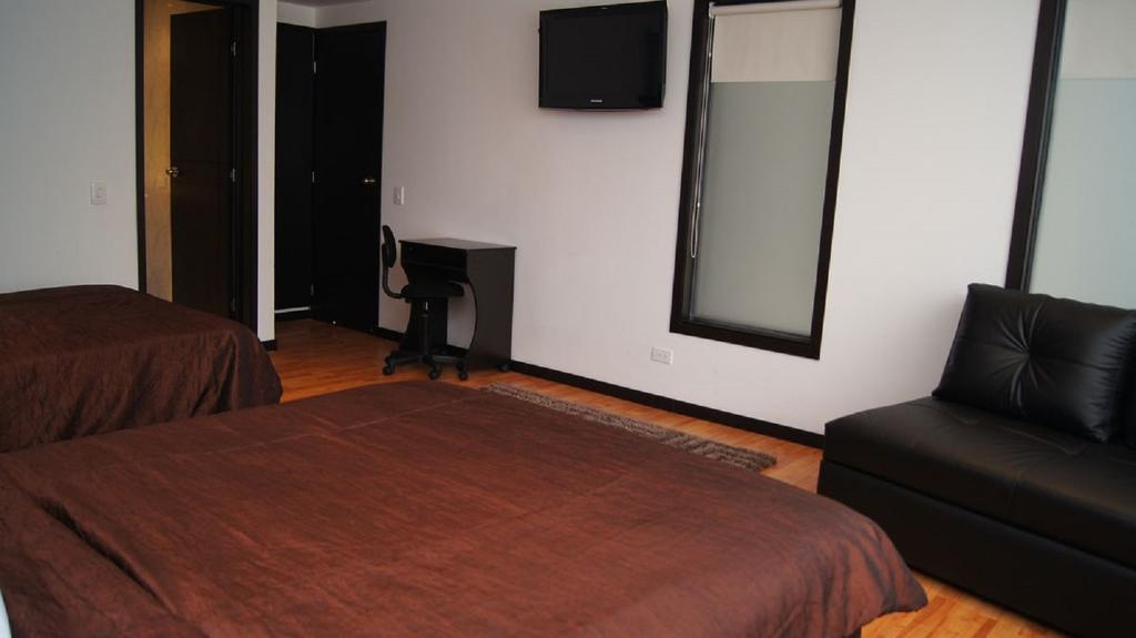 Hotel Dorado Plaza Богота Номер фото
